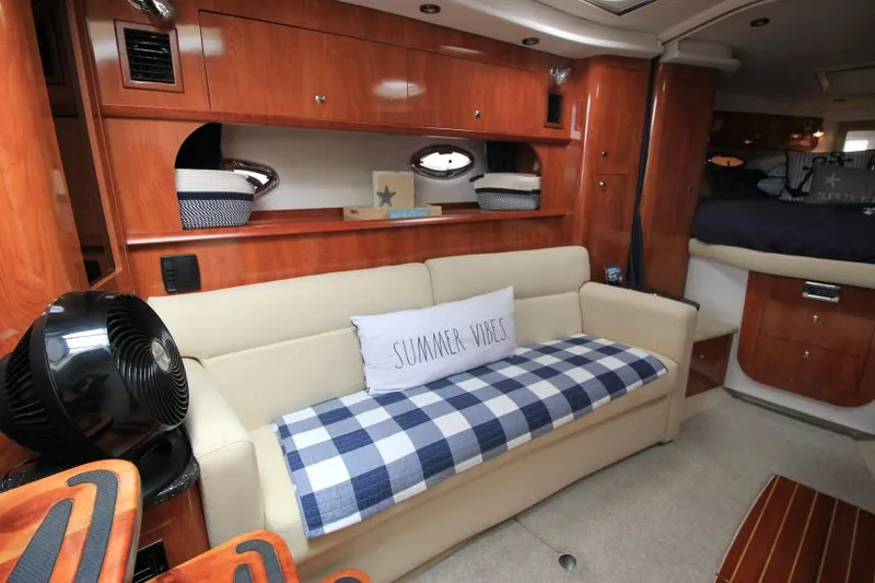 Slide: The Image of Interior of 2008 Four Winns V338 yacht with cozy seating and nautical decor. - 24