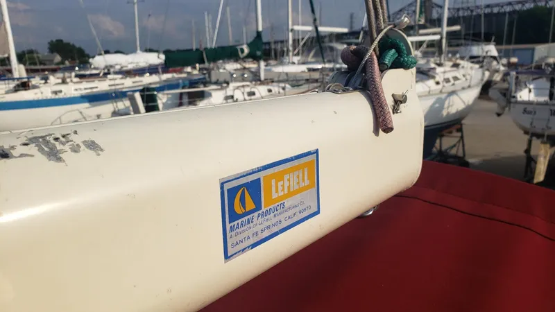 Slide: The Image of Close-up of a 1991 Pacific Seacraft 34 sailboat with LeFiell Marine Products label. - 13