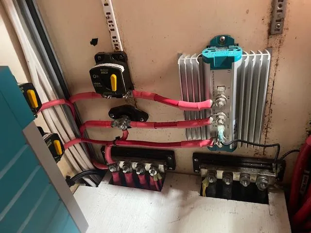 Slide: The Image of Electrical panel with red cables in a 1972 Fastnet Le Comte boat. - 13