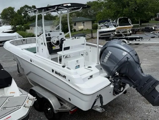 Slide: The Image of 2025 Wellcraft 202 Fisherman boat with Yamaha outboard motor on trailer. - 4