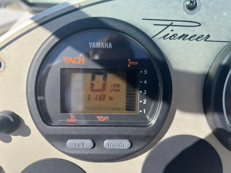Slide: The Image of Tachometer display on 2012 Pioneer 175 Venture boat, showing 118 hours. - 16