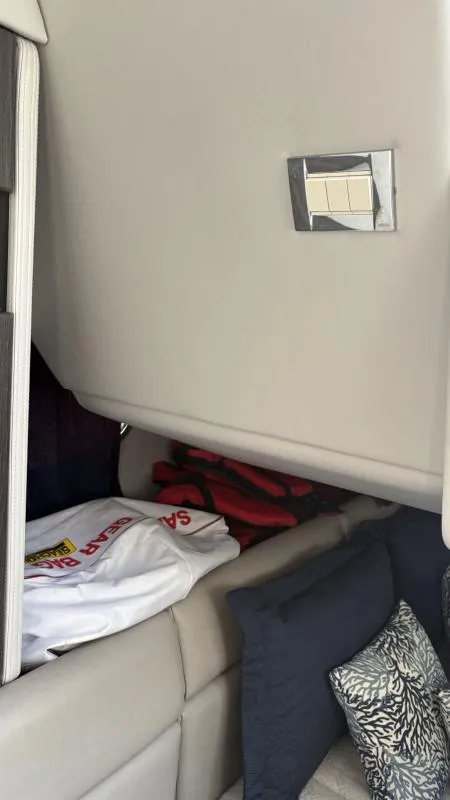 Slide: The Image of Interior of 2022 Formula 350 CBR boat with cushions and life jackets. - 31