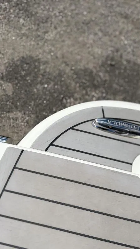 Slide: The Image of 2022 Formula 350 CBR boat deck with sleek design and branding. - 37