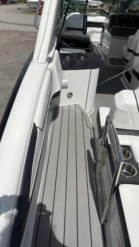 Slide: The Image of 2022 Formula 350 CBR boat interior with sleek seating and modern design. - 39