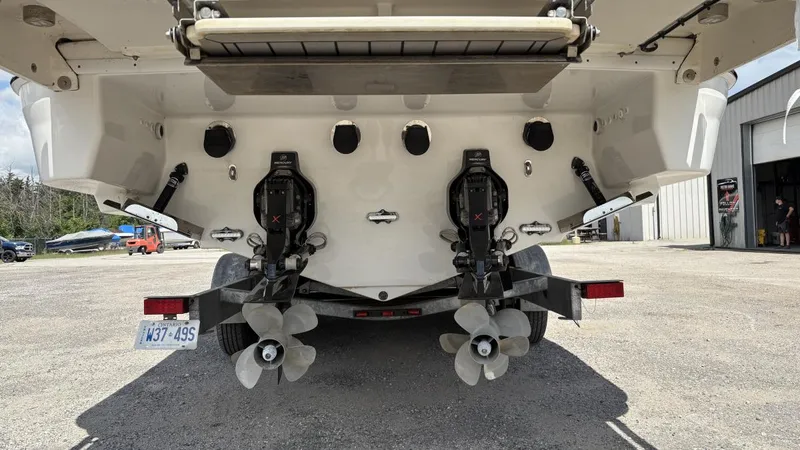 Slide: The Image of Rear view of a 2022 Formula 350 CBR boat with dual propellers. - 41