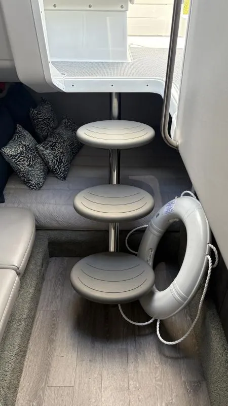 Slide: The Image of Interior of 2022 Formula 350 CBR boat with circular steps and a life preserver. - 42