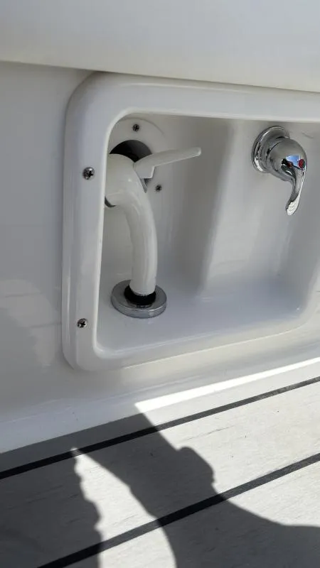 Slide: The Image of 2022 Formula 350 CBR boat faucet and showerhead detail. - 47