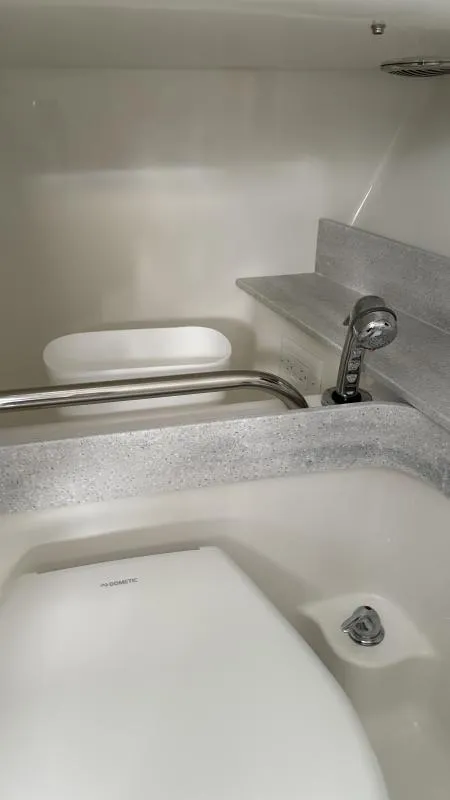 Slide: The Image of 2022 Formula 350 CBR boat bathroom with modern fixtures and sleek design. - 8