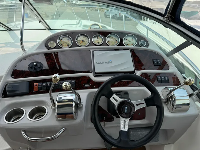 Slide: The Image of Control panel of a 2005 Chaparral Signature 350 boat with Garmin navigation system. - 8