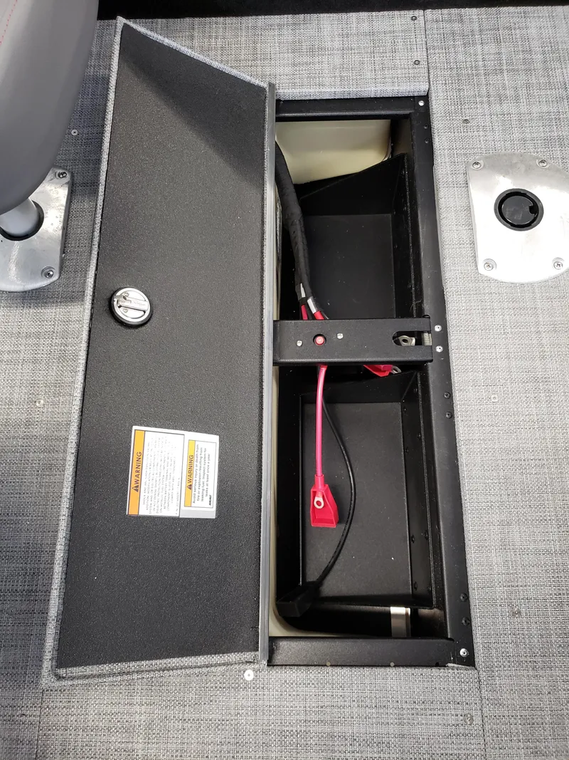 Slide: The Image of Open storage compartment in 2025 Alumacraft Competitor 175X Sport boat. - 14