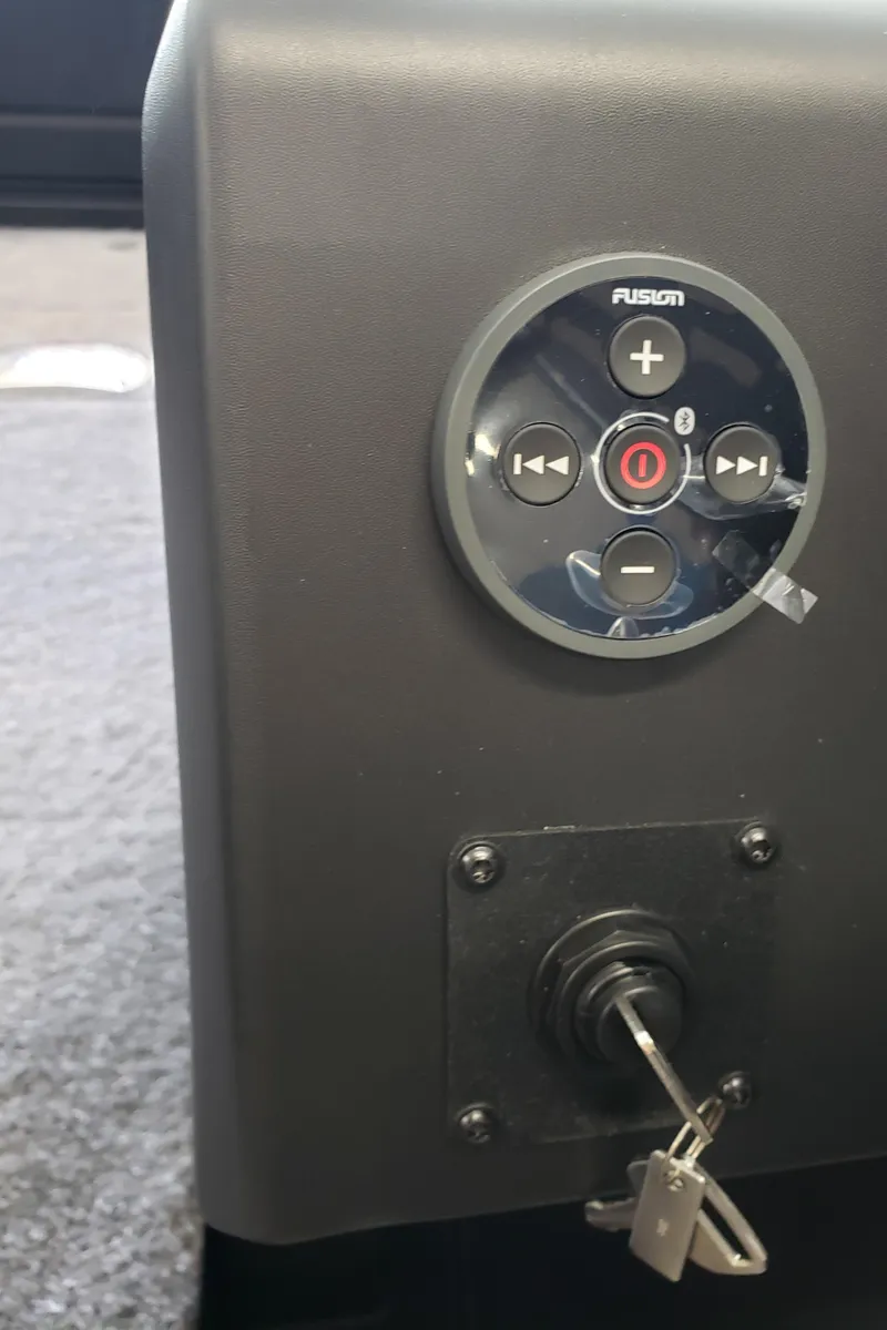 Slide: The Image of Control panel and ignition key of 2025 Alumacraft Competitor 175X Sport boat. - 8