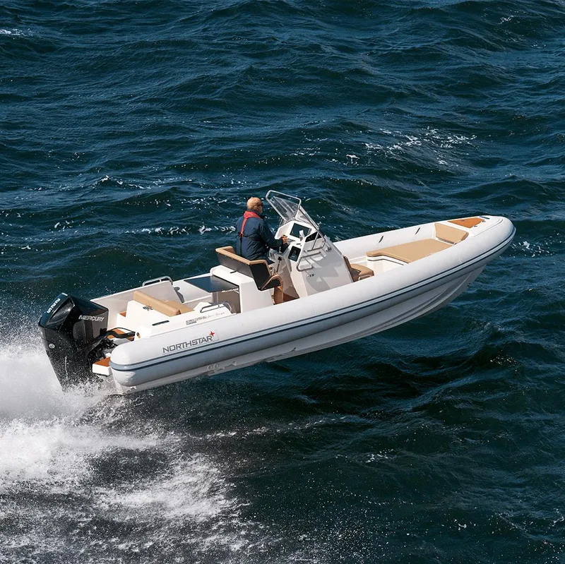 Slide: The Image of 2023 Northstar Orion 7 boat navigating through ocean waves at high speed. - 12