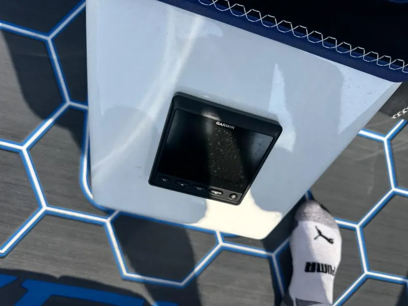 Slide: The Image of Garmin device on Wright Performance 420 boat, 2018 model, with hexagonal patterned flooring. - 18