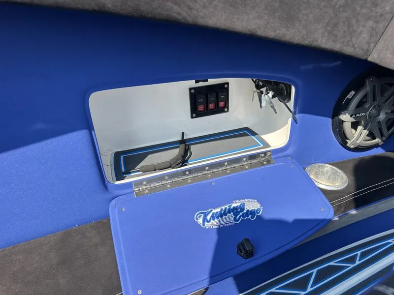 Slide: The Image of Interior of 2018 Wright Performance 420 boat with blue upholstery and JL Audio speaker. - 20