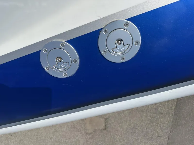 Slide: The Image of Fuel caps on a 2018 Wright Performance 420 boat, featuring a sleek blue and silver design. - 26