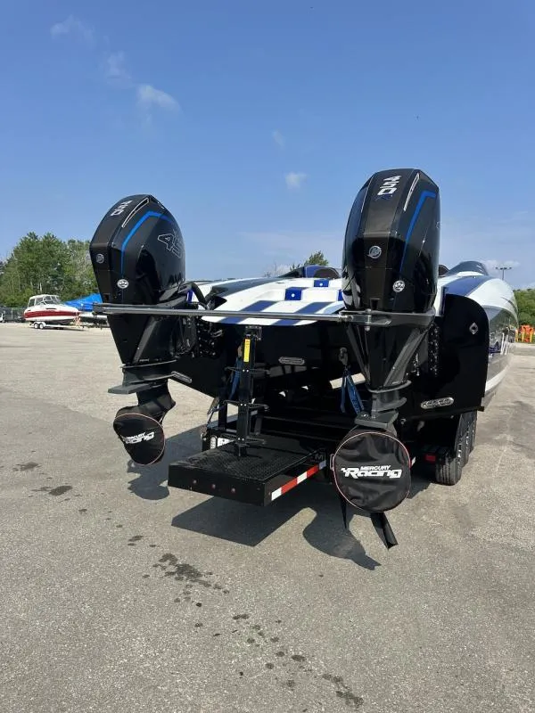 Slide: The Image of 2018 Wright Performance 420 boat with dual Mercury outboard engines on a trailer. - 5