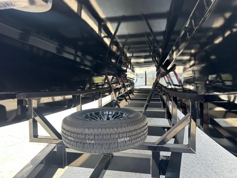 Slide: The Image of Underneath view of a 2018 Wright Performance 420 boat trailer with spare tire. - 6