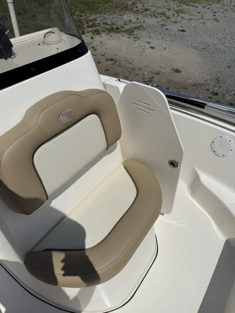 Slide: The Image of 2018 Key West 189 FS boat seat with beige and white upholstery. - 5