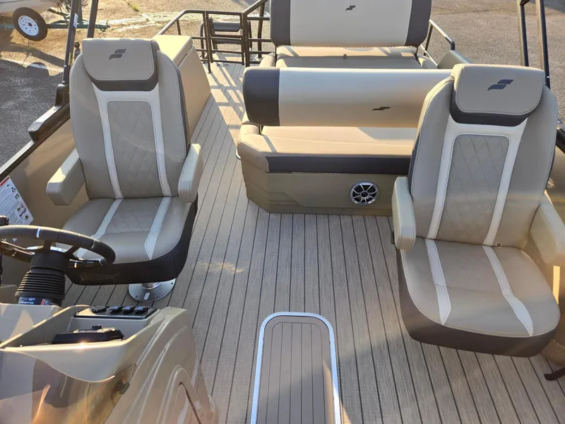 Slide: The Image of 2026 Starcraft EXS3DL boat interior with beige seating and modern design. - 10