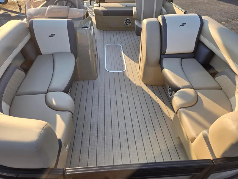 Slide: The Image of Luxurious interior of 2026 Starcraft EXS3DL boat with beige seating and sleek design. - 6