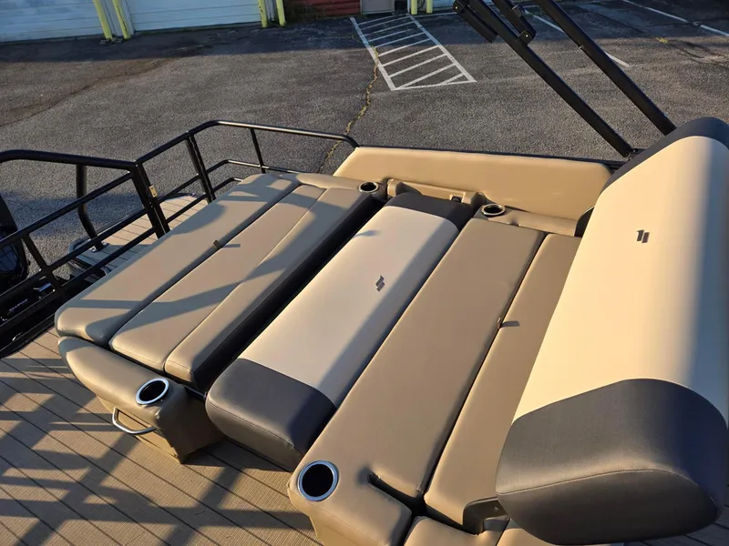 Slide: The Image of 2026 Starcraft EXS3DL boat seats with cup holders, beige and gray upholstery. - 7