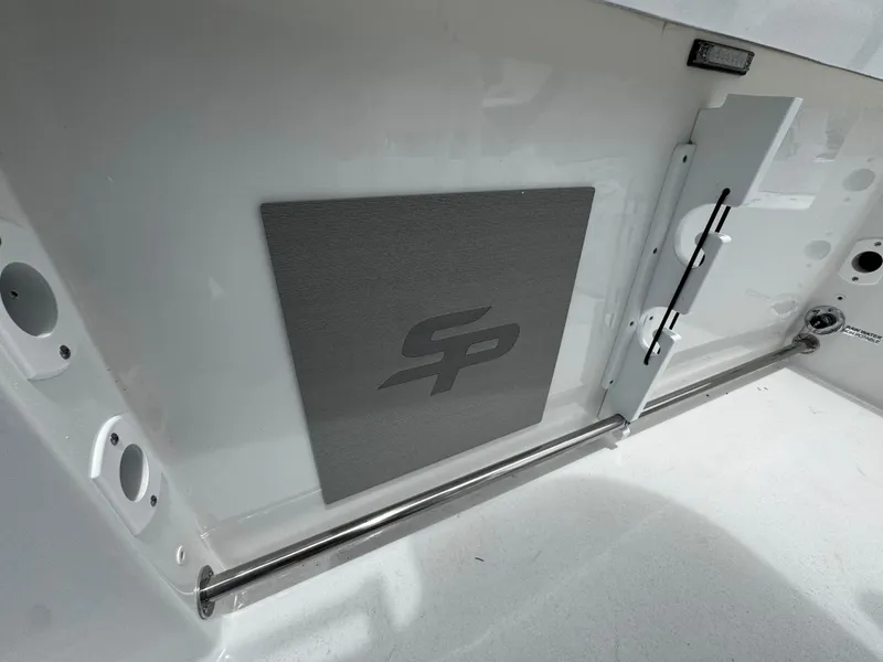 Slide: The Image of 2025 Sea Pro 225 Sandbar boat interior with logo and stainless steel fittings. - 25