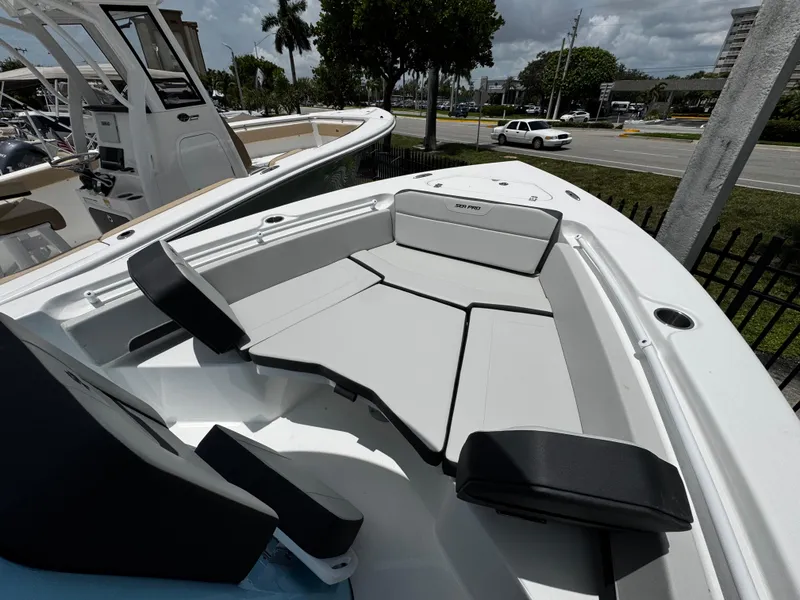 Slide: The Image of 2025 Sea Pro 225 Sandbar boat with spacious seating and sleek design. - 29