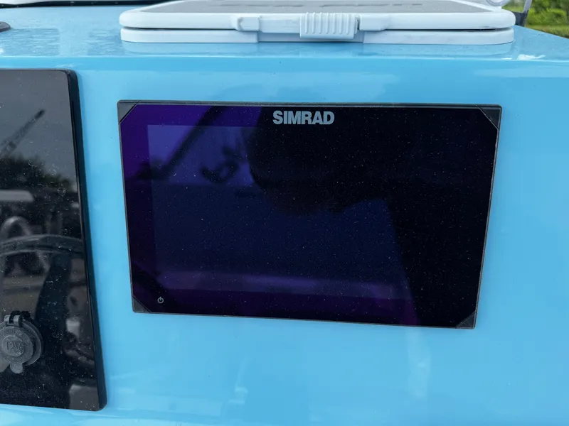 Slide: The Image of Simrad display on 2025 Sea Pro 225 Sandbar boat dashboard. - 8