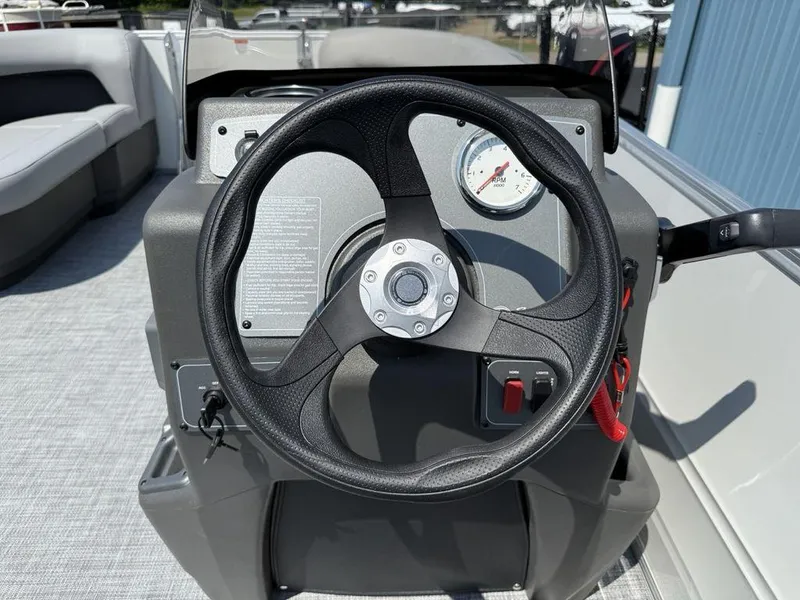 Slide: The Image of Steering console of 2026 Sun Tracker PARTY BARGE® 16 DLX pontoon boat. - 12