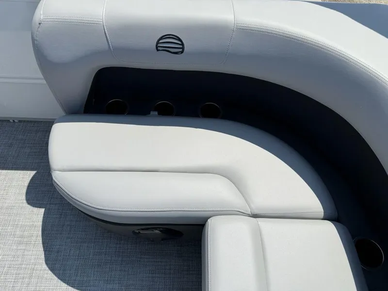 Slide: The Image of 2026 Sun Tracker PARTY BARGE® 16 DLX boat seating with cup holders, gray upholstery. - 14