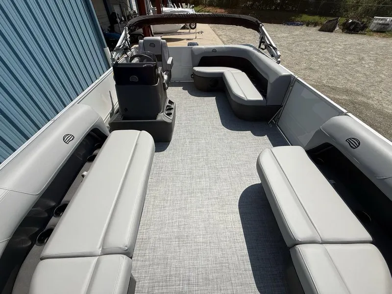 Slide: The Image of 2026 Sun Tracker PARTY BARGE® 16 DLX interior with spacious seating and modern design. - 21