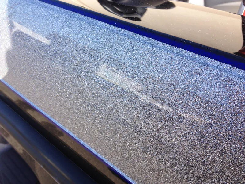 Slide: The Image of Close-up of 2015 Ranger Z119C Comanche Fusion Package's metallic blue finish. - 14