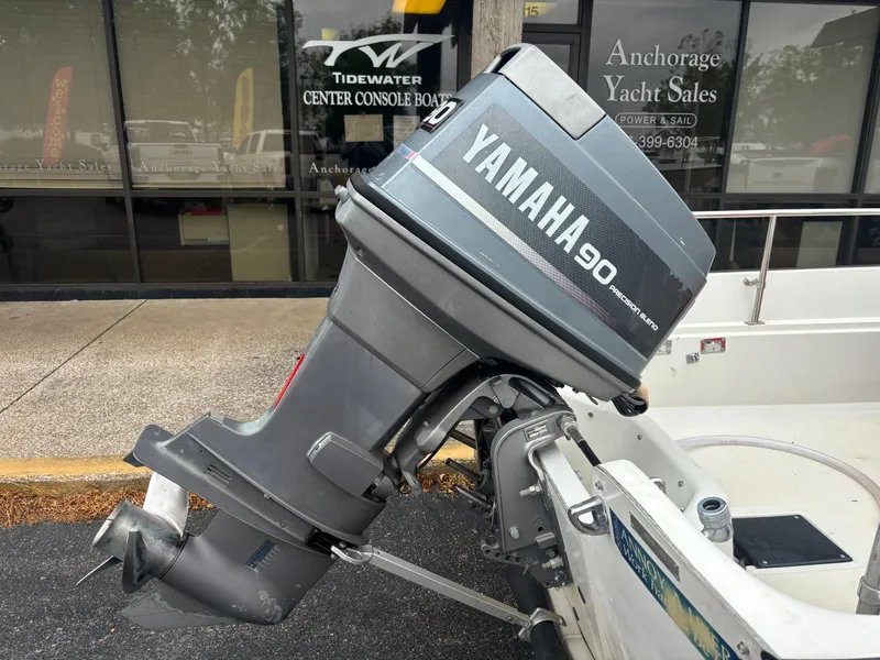 Slide: The Image of 1993 Boston Whaler 17 Montauk with Yamaha 90 outboard motor at Anchorage Yacht Sales. - 17