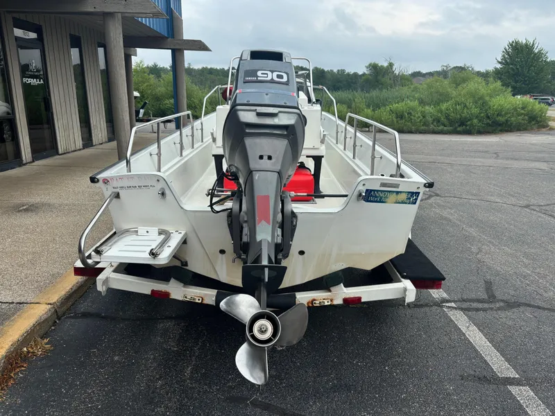 Slide: The Image of 1993 Boston Whaler 17 Montauk boat with Yamaha 90 outboard motor on trailer. - 5