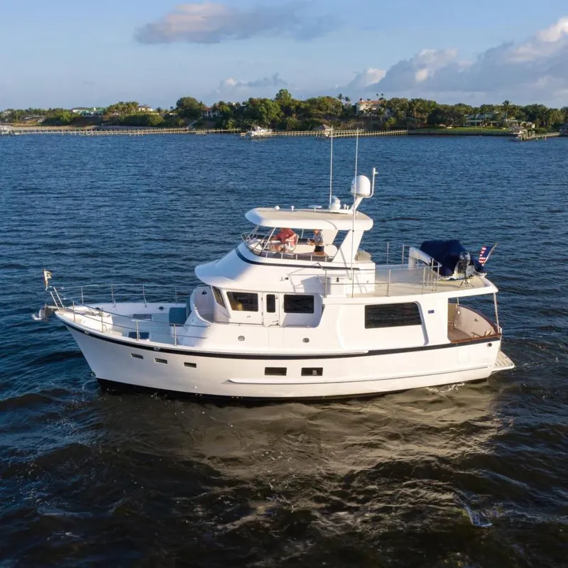 The Image of Kadey-Krogen 50 Open 2021 yacht cruising on calm waters under a clear sky. - 0