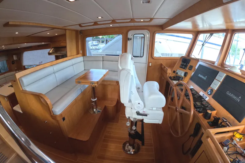 Slide: The Image of Luxurious interior of 2021 Kadey-Krogen 50 Open yacht with helm and seating area. - 15