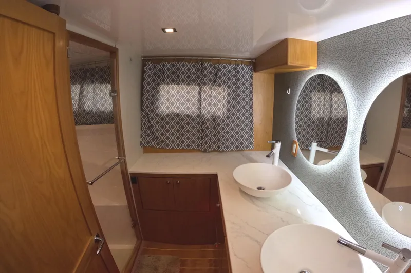 Slide: The Image of Luxurious bathroom interior of 2021 Kadey-Krogen 50 Open yacht with modern fixtures. - 25