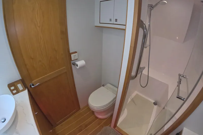 Slide: The Image of Bathroom interior of 2021 Kadey-Krogen 50 Open yacht with shower and toilet. - 26