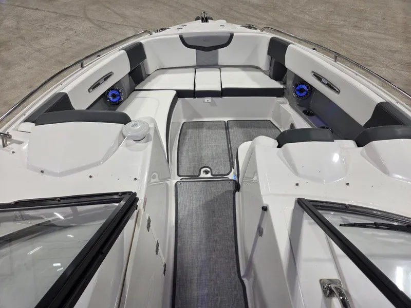 Slide: The Image of 2022 Chaparral 347 SSX boat interior with spacious seating and modern design. - 12