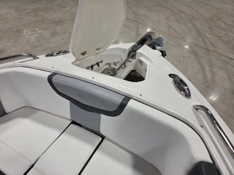 Slide: The Image of 2022 Chaparral 347 SSX boat interior with open anchor compartment. - 13