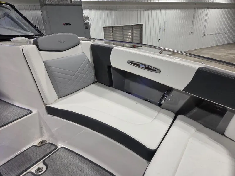 Slide: The Image of 2022 Chaparral 347 SSX boat interior with sleek seating and modern design. - 19