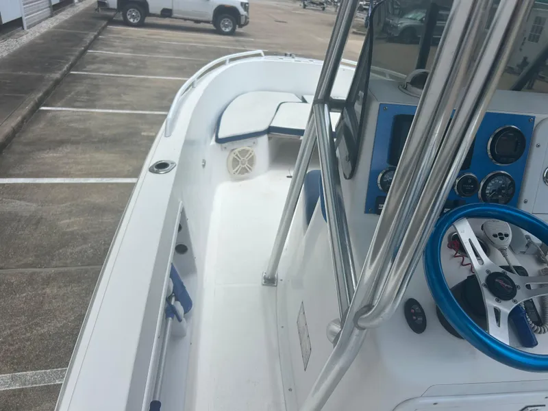 Slide: The Image of Concept 23 CC boat interior, 2001 model, featuring steering wheel and control panel. - 11