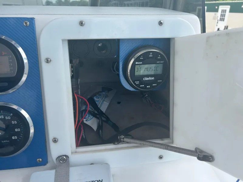 Slide: The Image of Boat dashboard with Clarion Bluetooth stereo, Concept 23 CC model, 2001. - 21