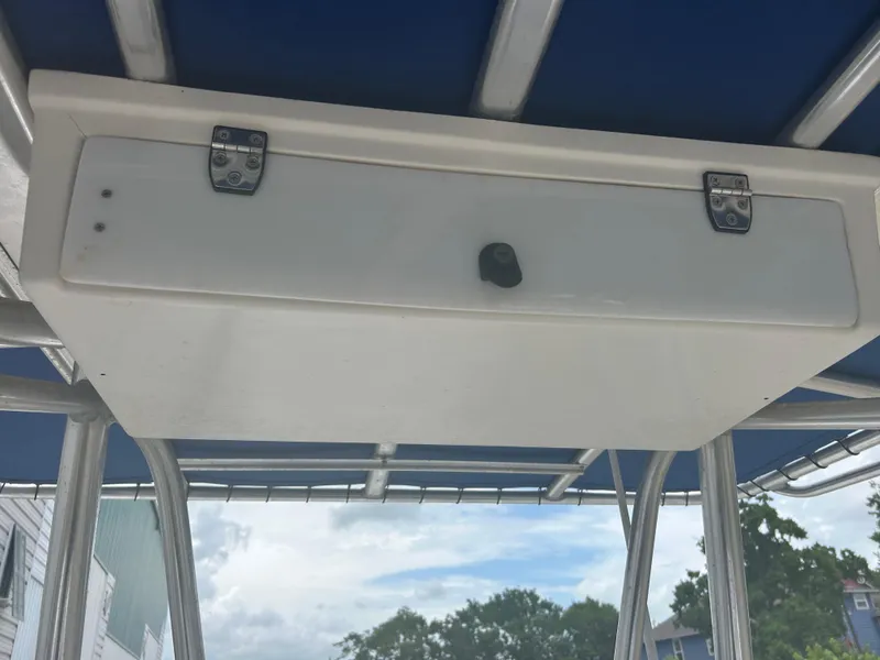 Slide: The Image of Boat storage compartment under blue canopy, Concept 23 CC, 2001 model. - 24