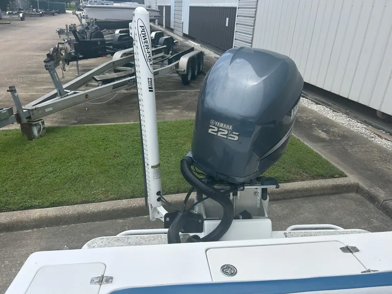 Slide: The Image of Boat with Yamaha 225 outboard motor and Power-Pole anchor, Concept 23 CC, 2001 model. - 27