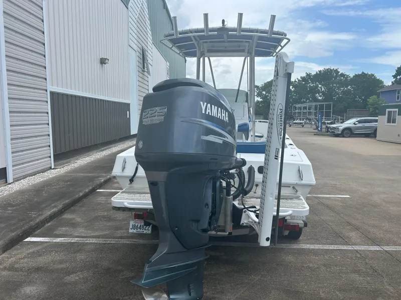 Slide: The Image of 2001 Concept 23 CC boat with Yamaha 225 outboard motor in parking lot. - 7