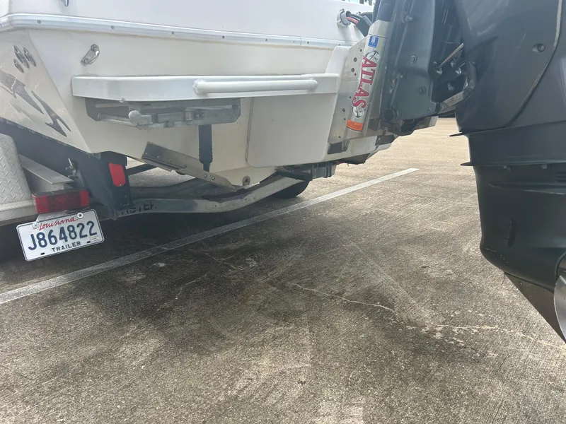 Slide: The Image of Rear view of Concept 23 CC boat on trailer, Louisiana license plate visible. - 8