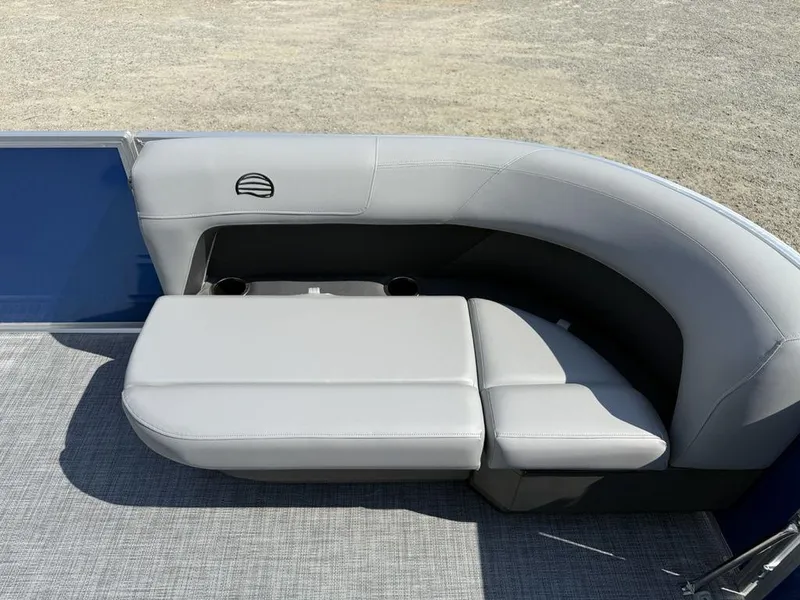 Slide: The Image of 2026 Sun Tracker PARTY BARGE® 16 DLX pontoon boat seating with gray upholstery and cup holders. - 3