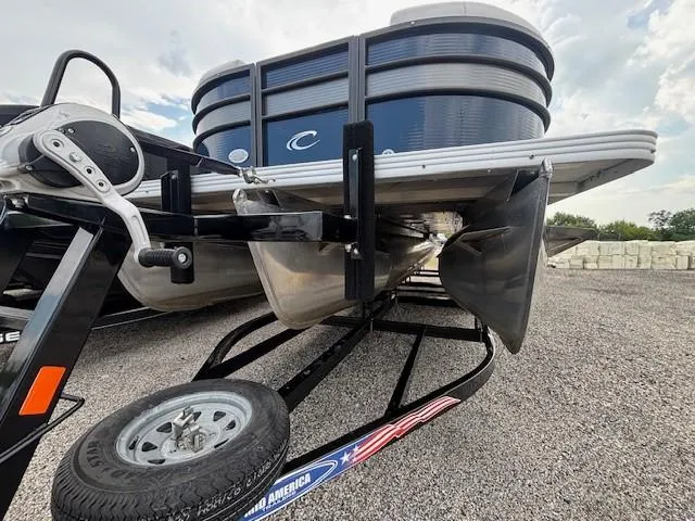 Slide: The Image of 2020 Crest Classic DLX 240 SLC pontoon boat on trailer, side view. - 10