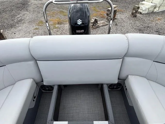Slide: The Image of 2020 Crest Classic DLX 240 SLC boat interior with Suzuki 150 engine. - 14